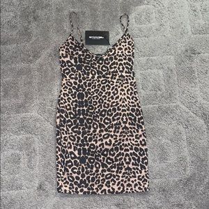 a leopard print bodycon dress